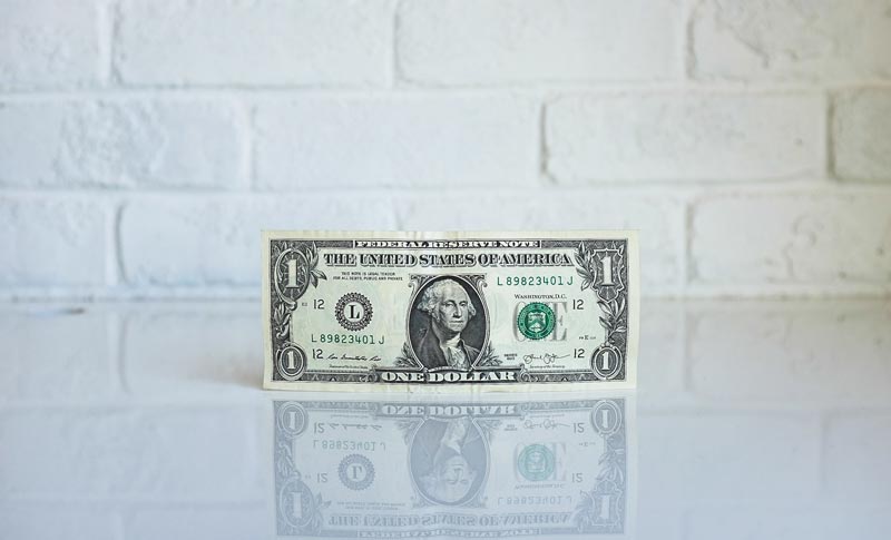 dollar bill image - strengthen your marriage by cutting the "overhead"