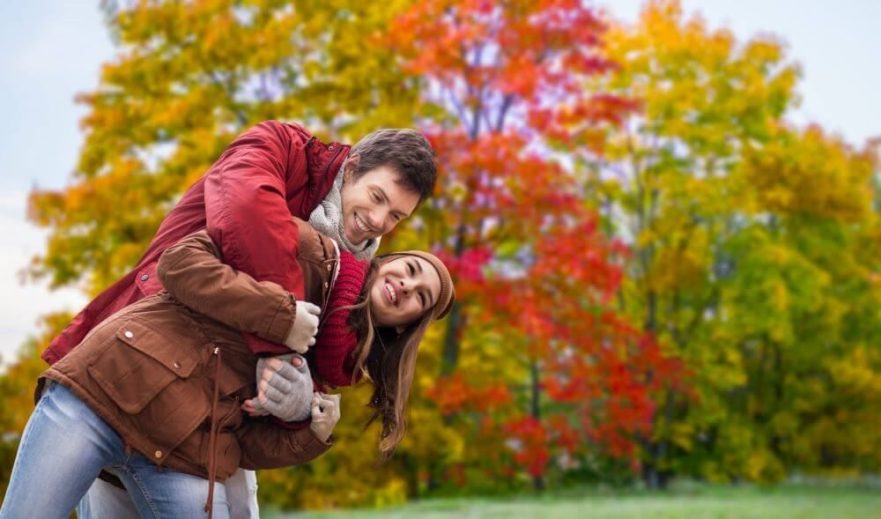 Couple outdoors in fall - fun fall date night ideas